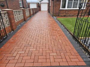 Block paved driveway pressure washing and sealing