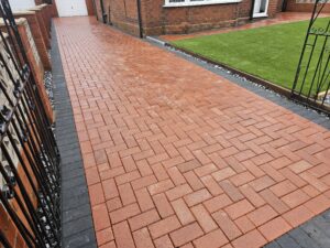 Block paved driveway pressure washing and sealing