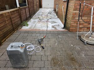Driveway washed and treated with Sodium Hypochlorite