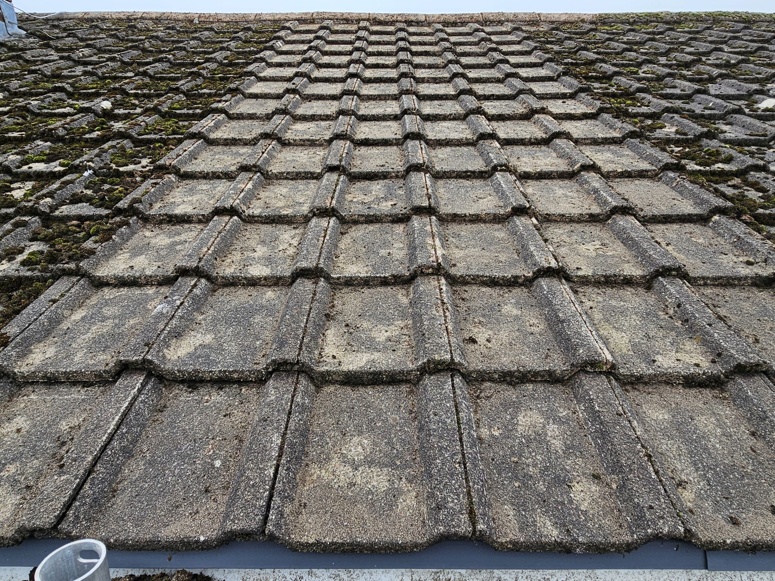 Roof Cleaning by Scraping in Progress in Stoke-on-Trent